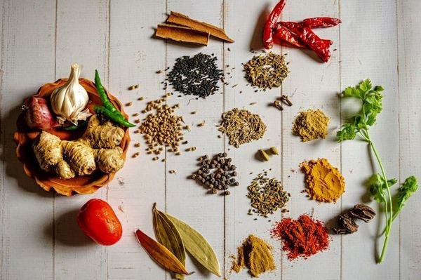 Bowl of Ayurvedic herbs and spices used in AryuVeda preparations